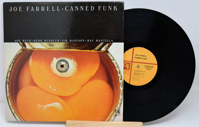 Vinyl record and cover titled 'Canned Funk' by Joe Farrell on a white background