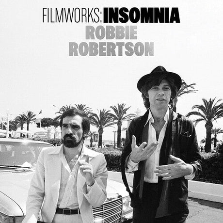 Filmworks: Insomnia album cover featuring Robbie Robertson and another man standing by a car with palm trees in the background