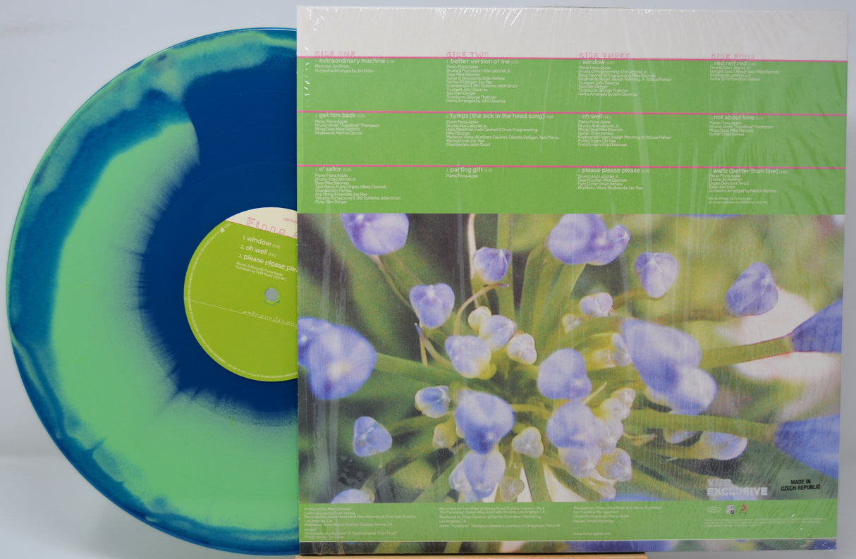 Vinyl record with blue and green swirl design and a floral illustration on the back cover.