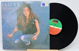 Vinyl record with cover featuring a person and colorful label