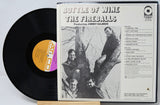 A vinyl record album for 'Bottle of Wine' by The Fireballs, featuring Jimmy Gilmer. The black LP record is partially pulled from the white cover, which displays the tracklist and a black-and-white photo of the band members.