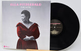 Vinyl record with cover featuring Ella Fitzgerald on a white background