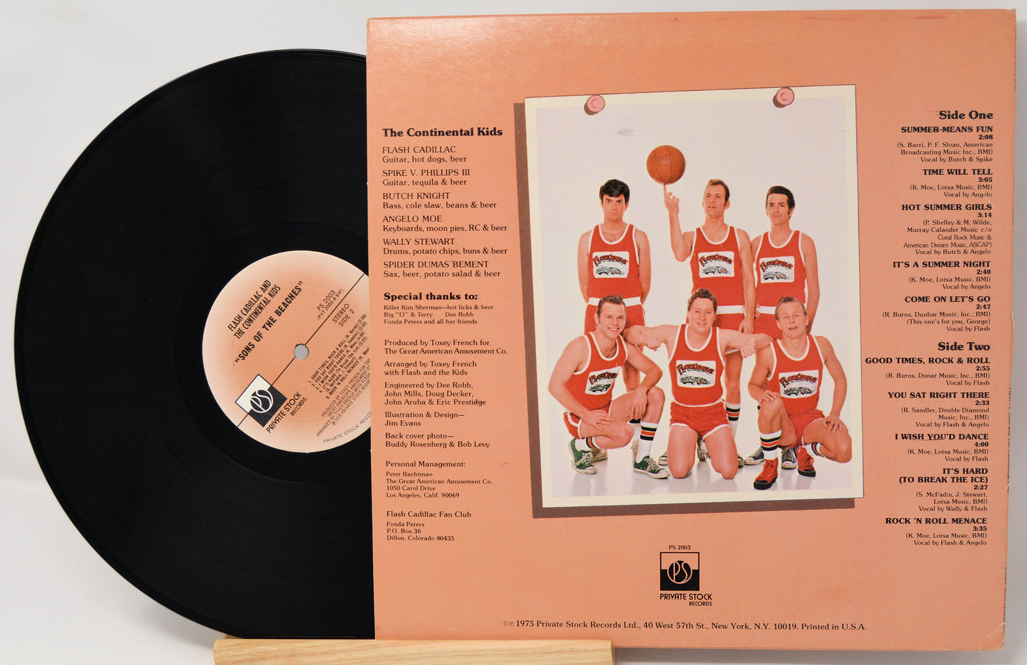 Vinyl record with a basketball team cover on a white background