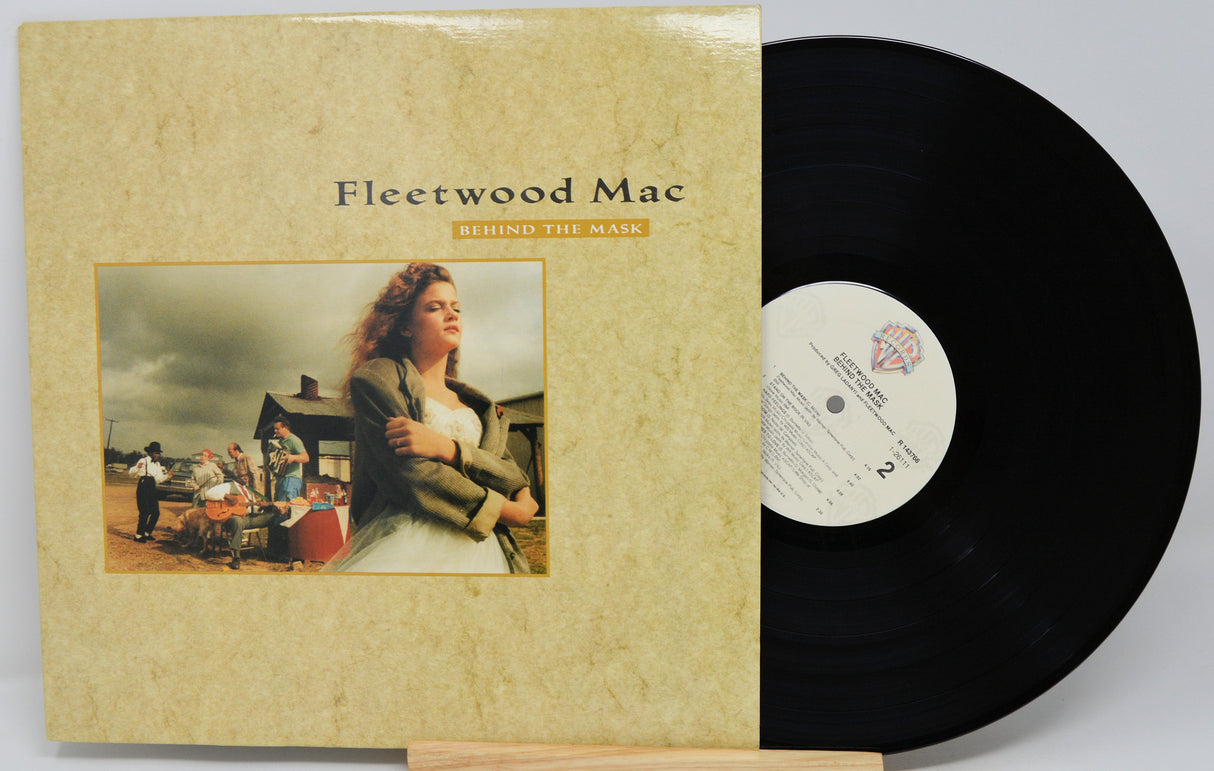 Fleetwood Mac - Endin' the Pain vinyl record LP shown with the beige album cover standing to the left and the black record partially pulled out to the right on a light gray background.