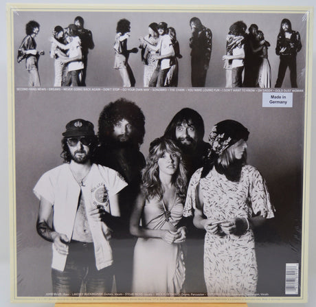 Black and white album cover for Fleetwood Mac, 'Rumours' with band members and text, featuring a 'Made in Germany' label.