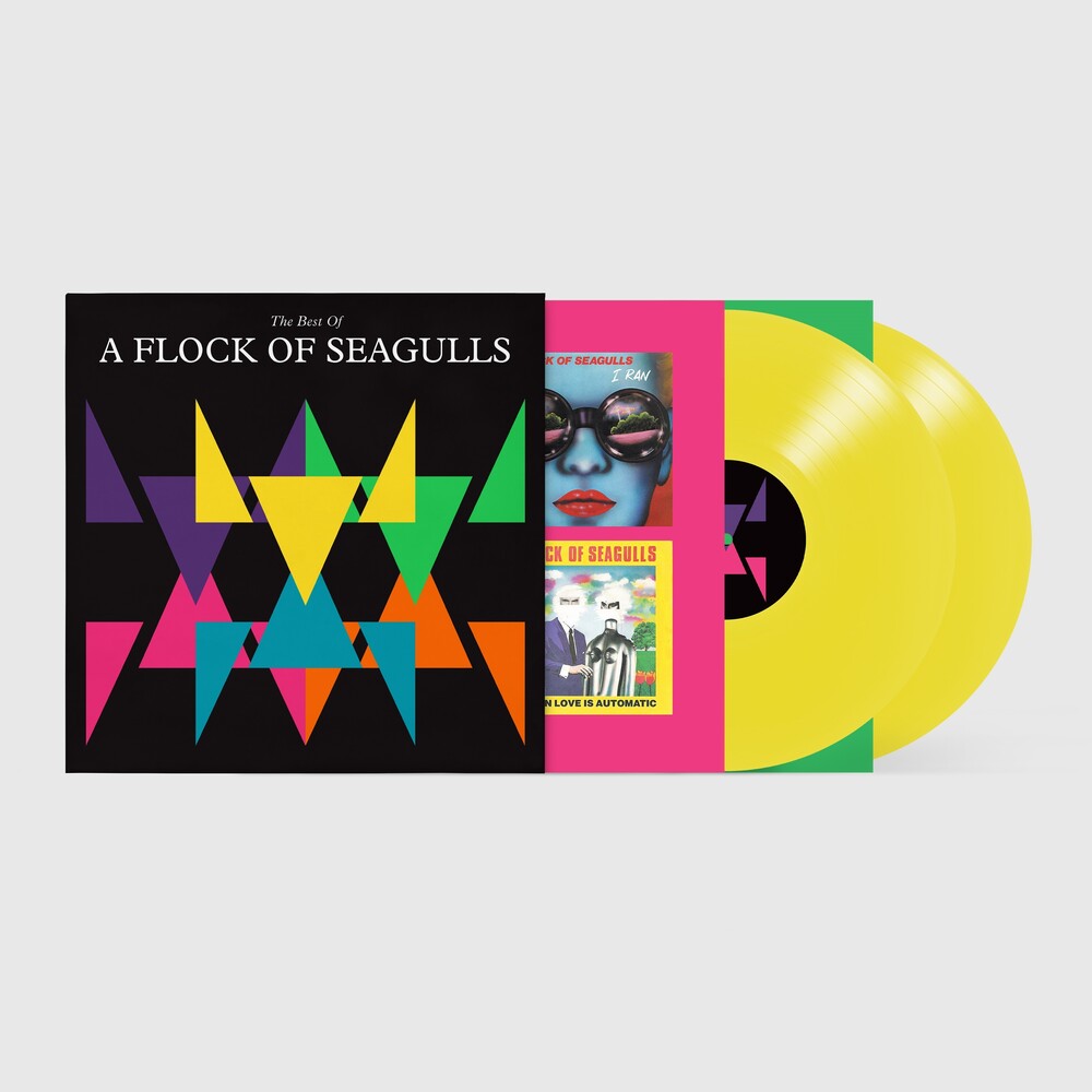 A vinyl record album set for 'The Best Of A Flock Of Seagulls' shown on a light gray background. The set includes a black sleeve with a colorful geometric graphic, a hot pink inner sleeve with a stylized portrait of the band, and two translucent yellow records partially pulled out.
