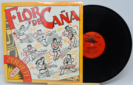 Vinyl record with colorful cover featuring dancing figures and text.