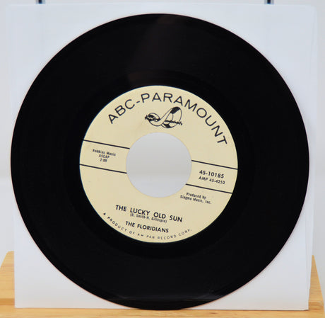 45 RPM record with ABC-Paramount label on a white background