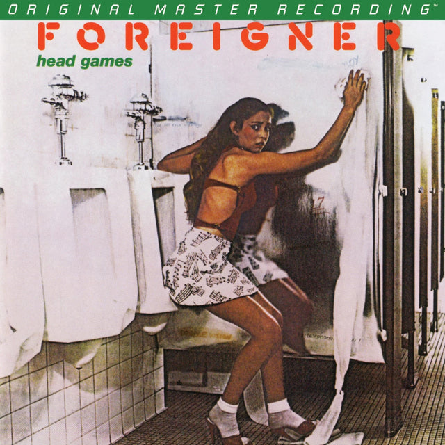 Album cover of 'Head Games' by Foreigner featuring a woman in a bathroom.