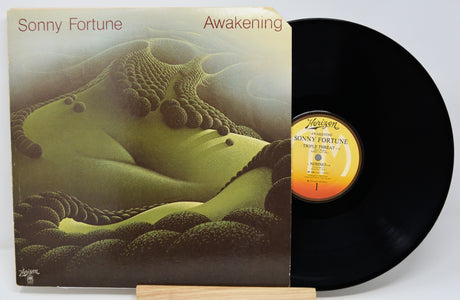 Vinyl record and cover titled 'Awakening' by Sonny Fortune on a white background