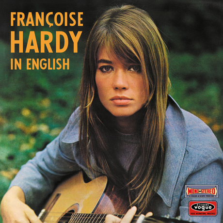 Album cover featuring Françoise Hardy with a guitar, set against a natural background titled 'In E.glish'