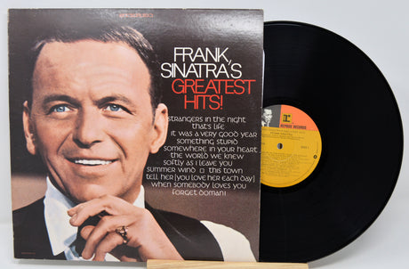 Vinyl record with cover featuring Frank Sinatra's face and album title on a white background