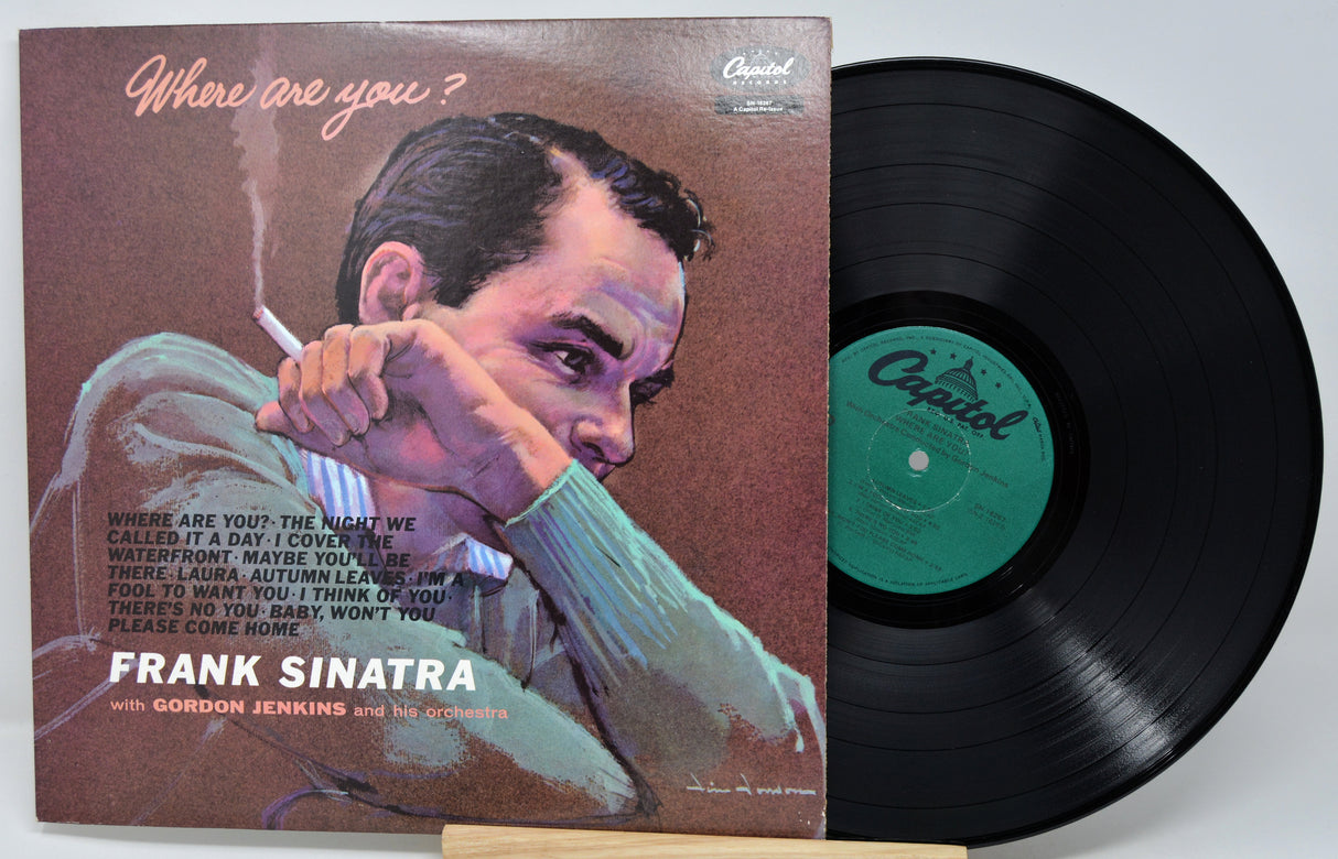 Vinyl record with Frank Sinatra cover on a white background