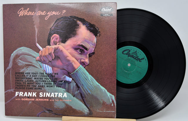 Vinyl record with Frank Sinatra cover on a white background