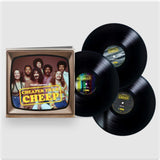 3 Vinyl records and front cover art for Frank Zappa's album 'Cheaper Than Cheep' featuring a photo of Frank Zappa and other band members in front of a television set with the album title text overlay.
