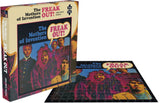 A 1000 piece jigsaw puzzle box with the image of the 'Freak Out!' album cover, featuring a collage of the band members' faces in a colorful, psychedelic style.