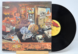 'Frank Zappa, Over-Nite Sensation' Vinyl record with a colorful cover featuring a scene of people in a diner.