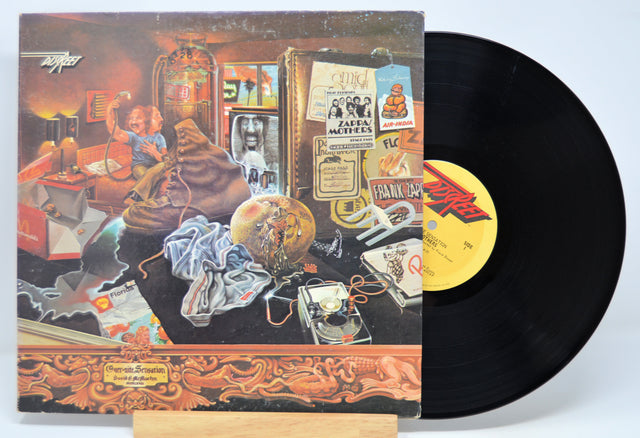 'Frank Zappa, Over-Nite Sensation' Vinyl record with a colorful cover featuring a scene of people in a diner.