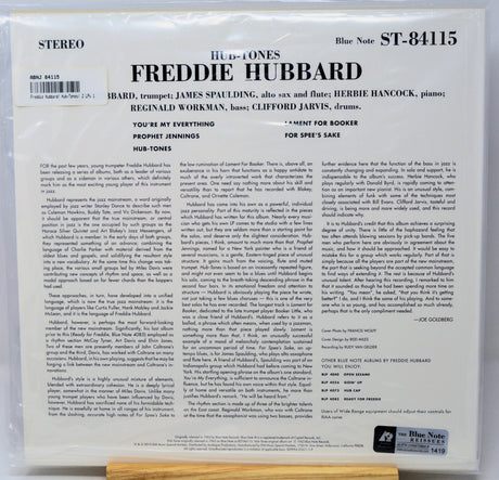 The back cover of a Blue Note CD release for Freddie Hubbard, showing track listings, credits, and a small Blue Note logo sticker in the bottom right corner, photographed resting on a wooden surface.