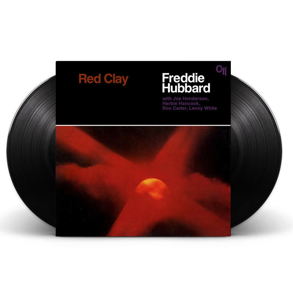 Freddie Hubbard's 'Red Clay' vinyl record album with two black records partially visible behind the square album cover on a white background.