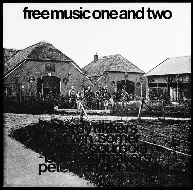 Black and white album cover of 'Free Music One and Two' with a group standing in front of rustic farmhouses.