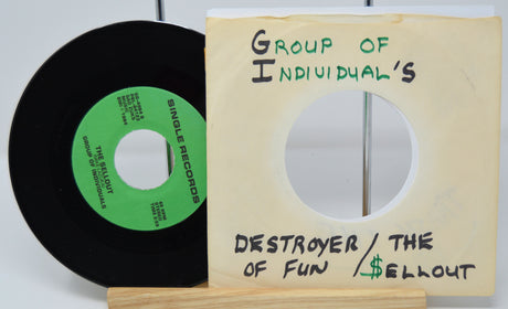 Vinyl record with a green label and wooden sleeve labeled 'Group of Individual's' on a white background.