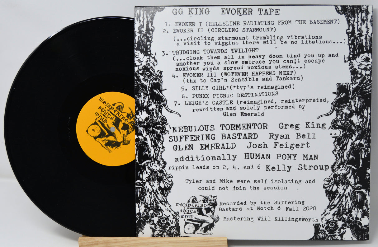 Vinyl record with a black cover featuring text and graphics on a white background