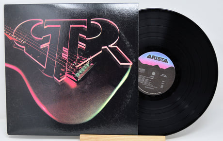 Vinyl record with a colorful 'GTR' design on the cover and 'Arista' label.