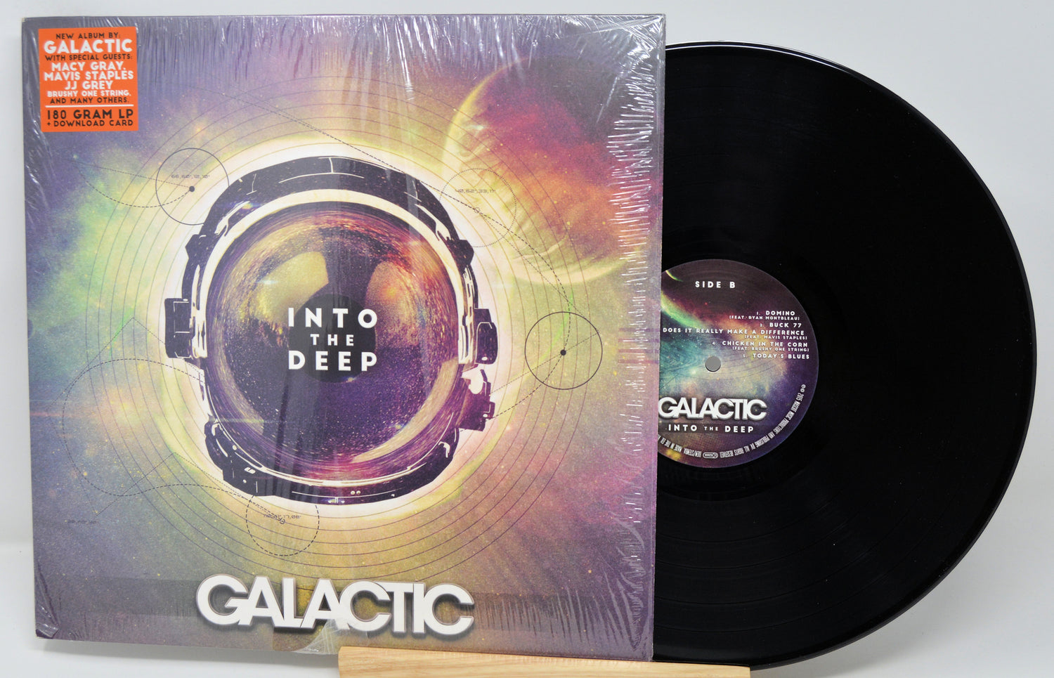 Vinyl record with cover titled 'Into the Deep' by Galactic on a white background