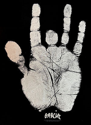 White handprint art on black background with Garcia signature underneath