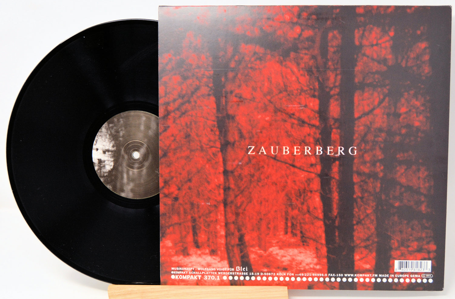 Vinyl record with a red forest cover featuring the word 'Zauberberg'.