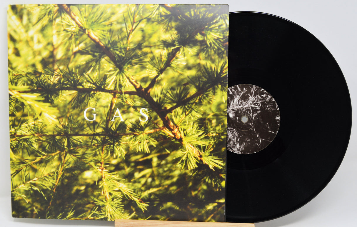 Vinyl record with a cover featuring green foliage and the word 'GAS'.