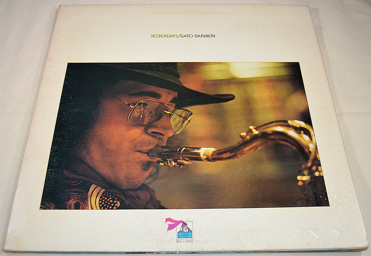 Back cover of Gato Barbieri's Yesterdays album featuring a portrait with saxophone