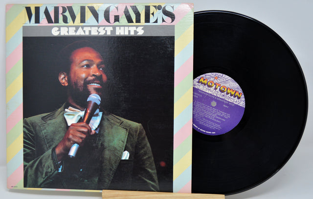 Vinyl record with cover featuring Marvin Gaye's 'Greatest Hits' on a white background