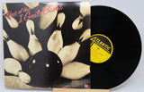 Vinyl record with cover featuring bowling pins and 'Best of the J. Geils Band' text, Atlantic label visible.