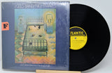 Vinyl record and cover with 'J. Geils Band Nightmares' on a white background
