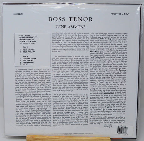 The back cover of a vinyl record sleeve for Gene Ammons's 'Boss Tenor' on Prestige 7180, photographed flat against a white background with a small wooden surface visible at the bottom.