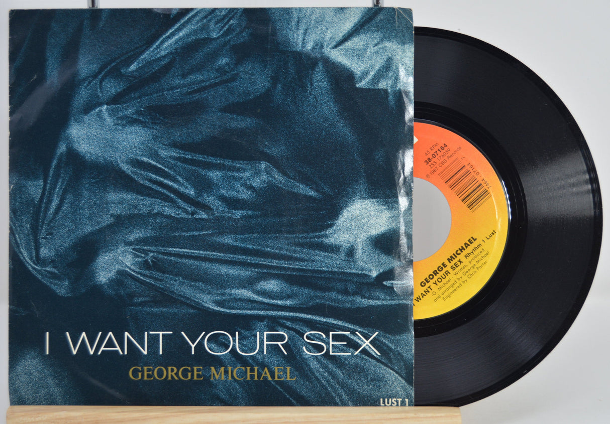 George Michael 'I Want Your Sex' vintage 7-inch vinyl single with blue cover and record half-exposed