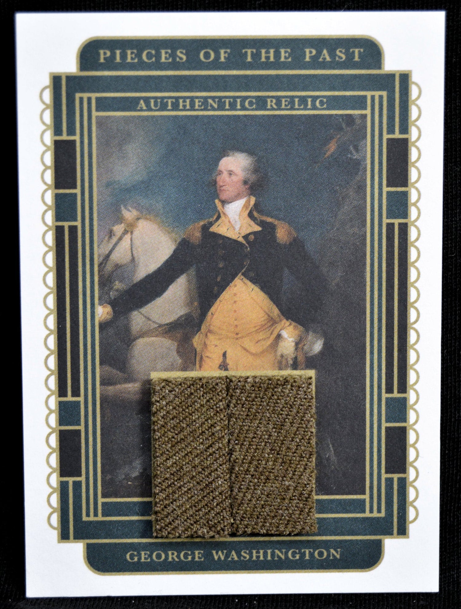 George Washington relic card featuring authentic fabric swatch and portrait
