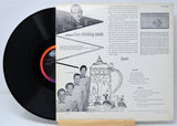Vinyl record 'German Beer Drinking Music' with a detailed cover featuring text and illustrations on a white background