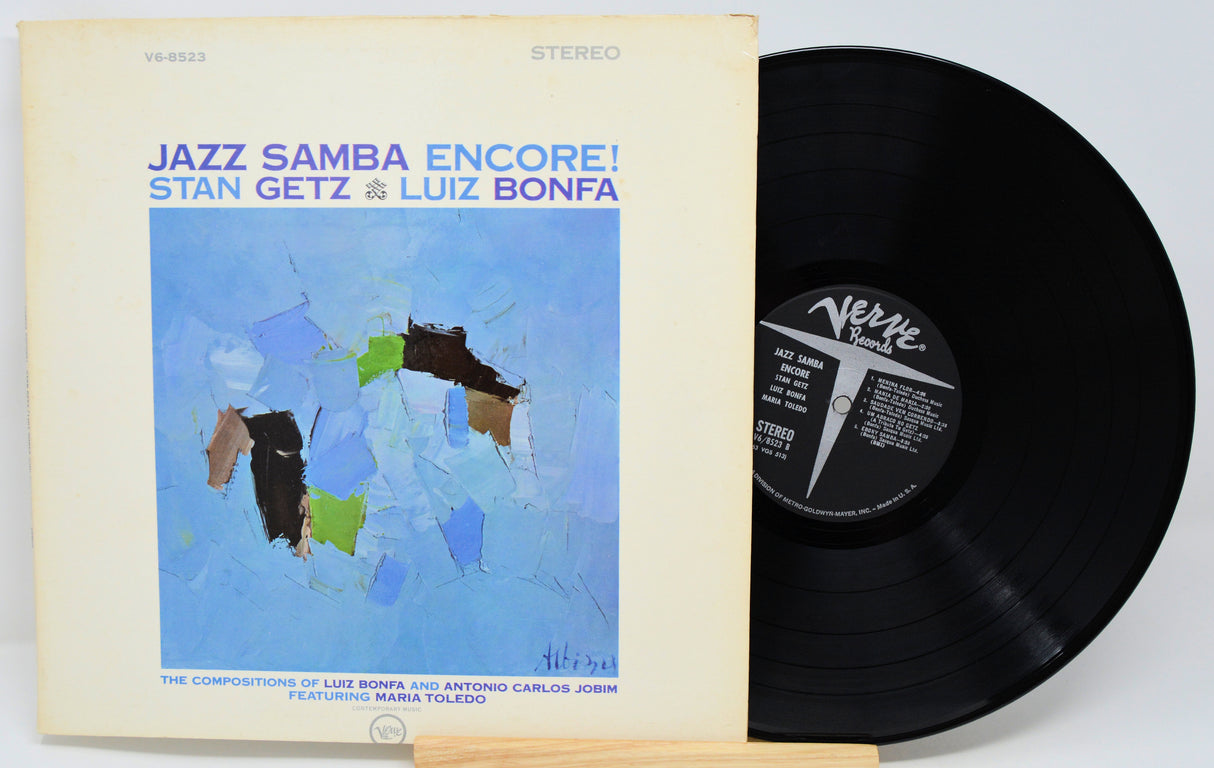 Vinyl record with cover titled 'Jazz Samba Encore!' by Stan Getz & Luiz Bonfá on a white background.