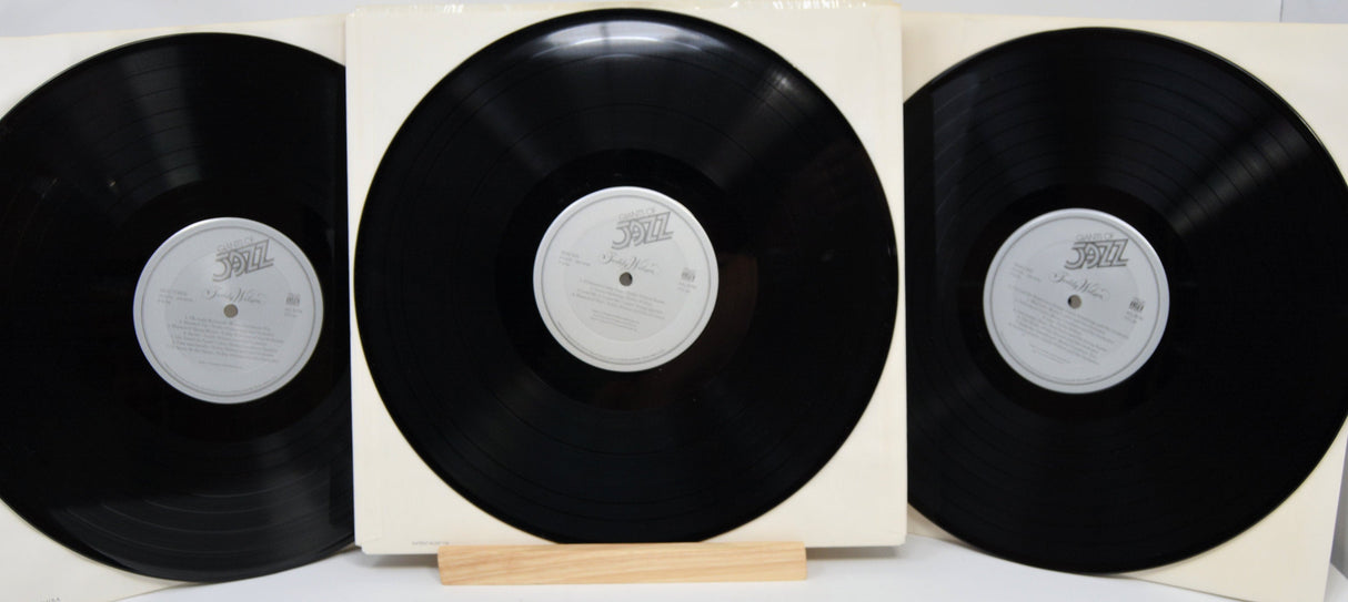 Three black vinyl records from the Giants of Jazz Teddy Wilson collection displayed