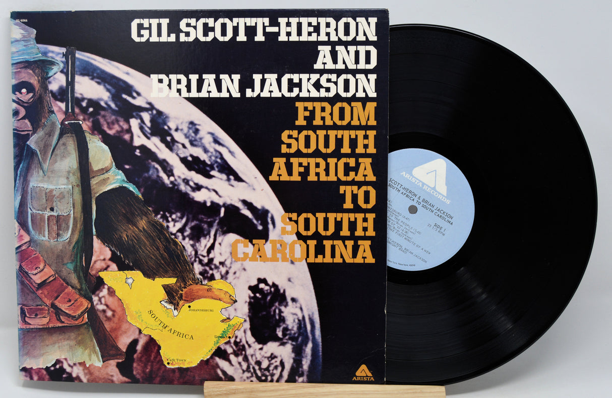 Vinyl record with cover featuring 'Gil Scott-Heron and Brian Jackson' on a white background