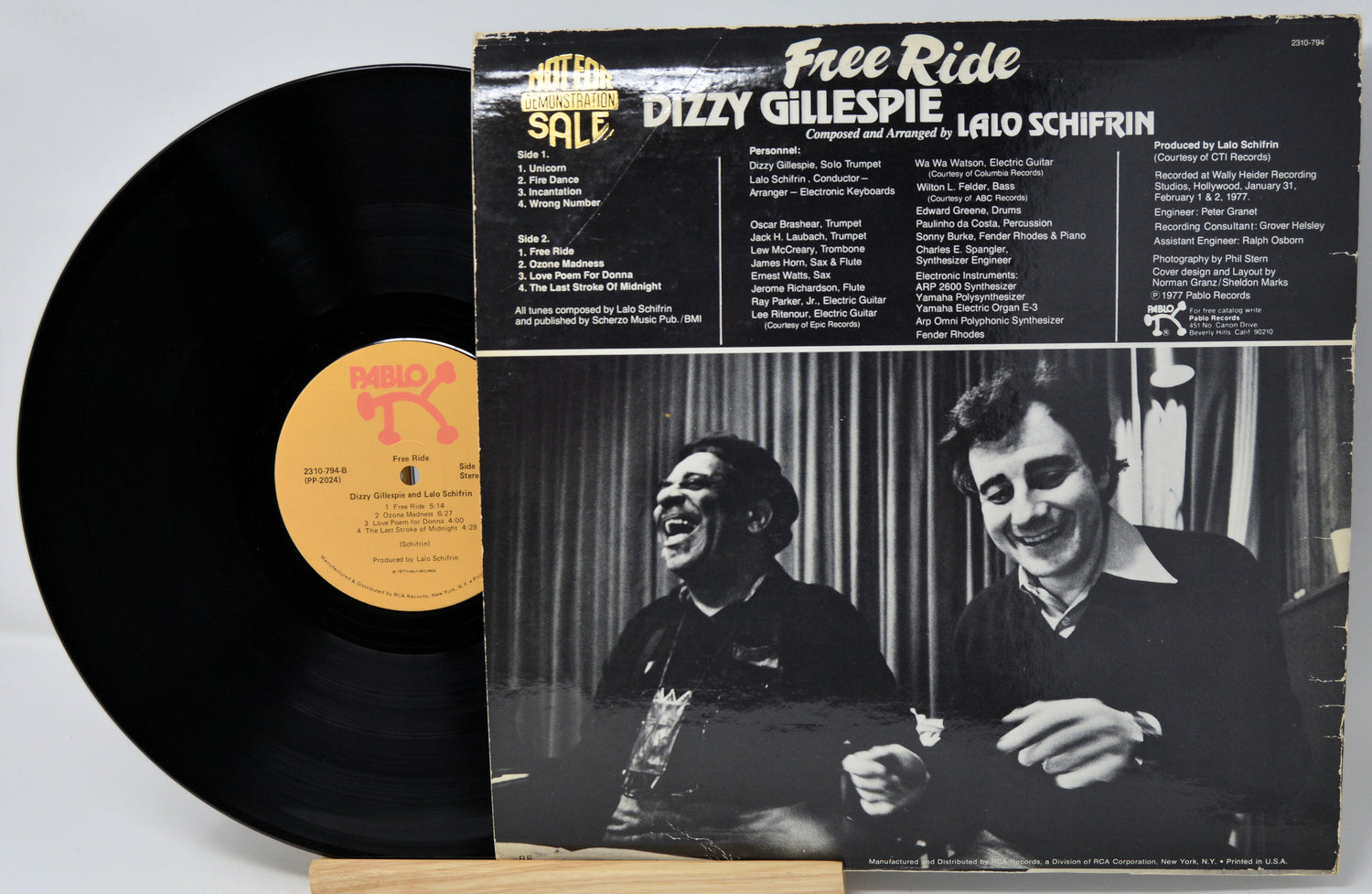 Vinyl record with cover featuring Dizzy Gillespie and Lalo Schifrin, displayed on a white background.