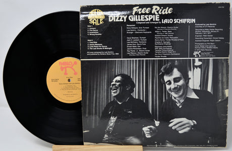 Vinyl record with cover featuring Dizzy Gillespie and Lalo Schifrin, displayed on a white background.