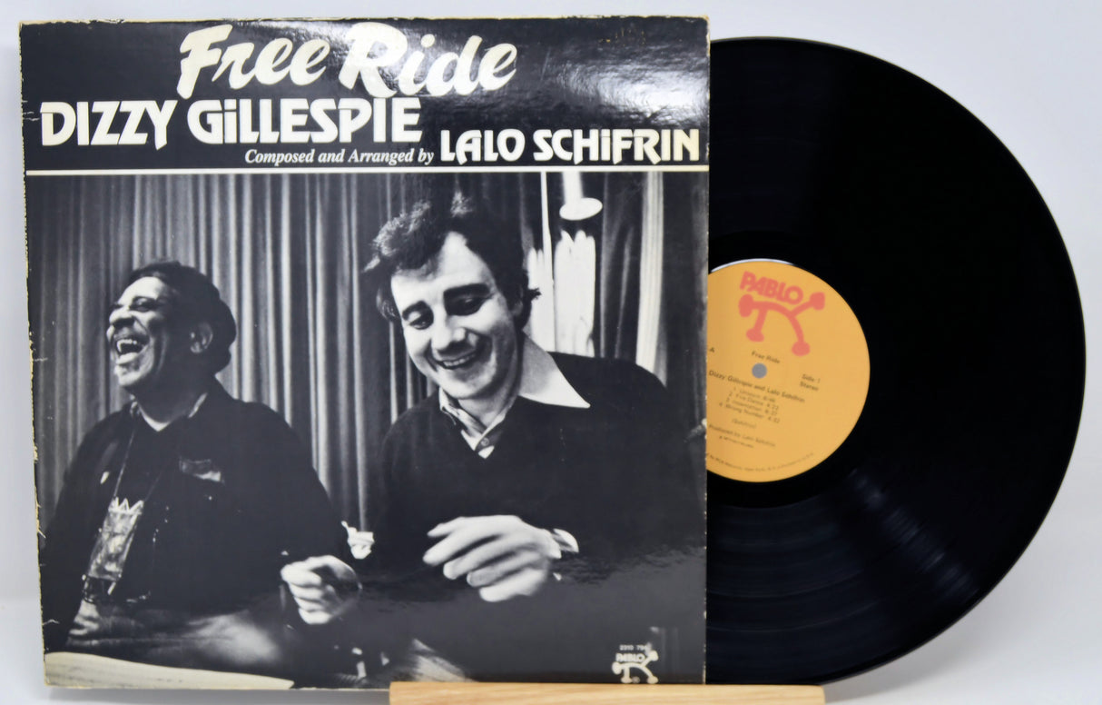 Vinyl record with cover featuring Dizzy Gillespie and Lalo Schifrin, titled 'Free Ride'.