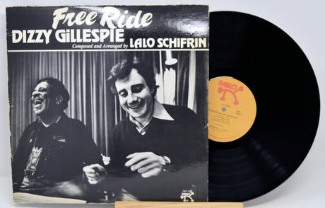 Vinyl record with cover featuring Dizzy Gillespie and Lalo Schifrin, titled 'Free Ride'.