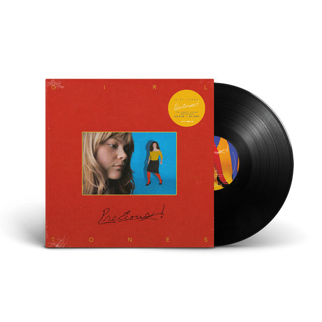 A vinyl record package shown on a white background, featuring a red square album cover with a central portrait photo and a partially visible black vinyl record behind it.