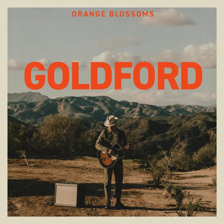 Album cover with a person playing guitar in a scenic landscape, featuring the text 'Orange Blossoms Goldford'.