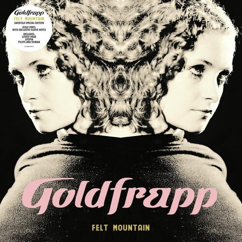 Album cover for Goldfrapp's 'Felt Mountain' with a stylized portrait and text.